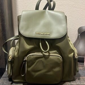 Michael Kors green backpack